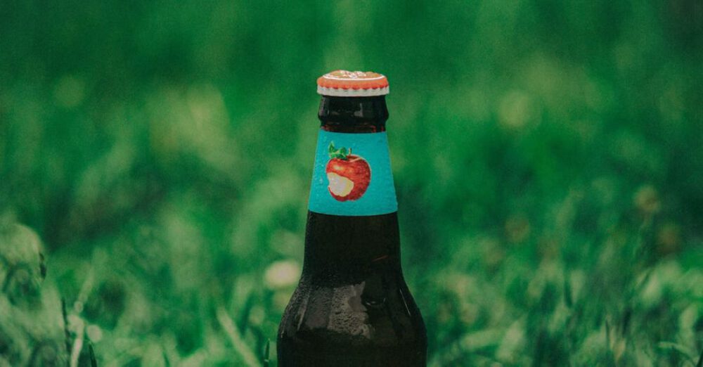 Cider - A Bottle of Cider on the Grass