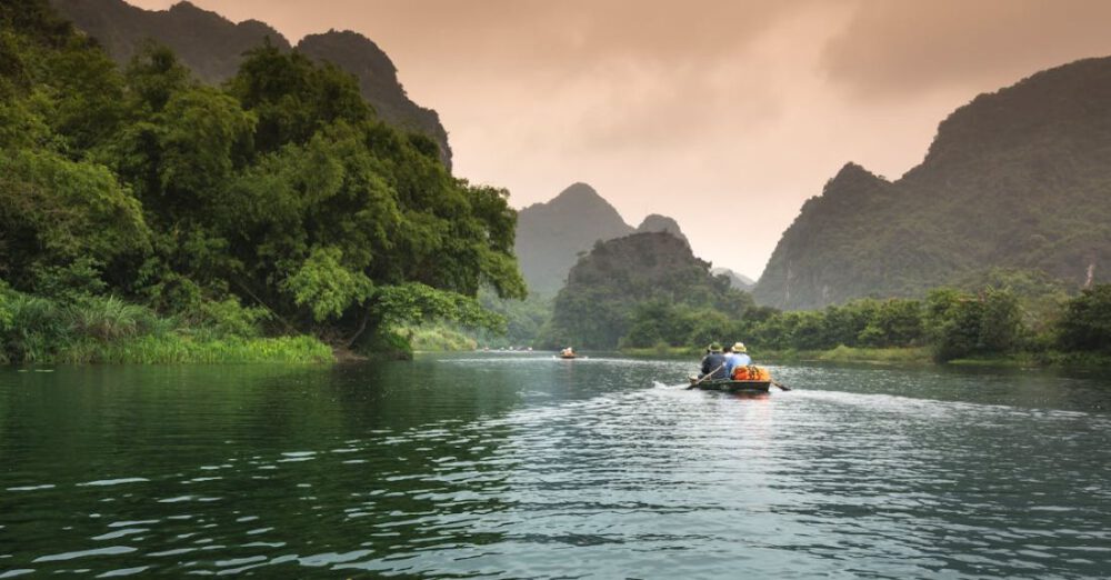 Tour - People Riding a Boat