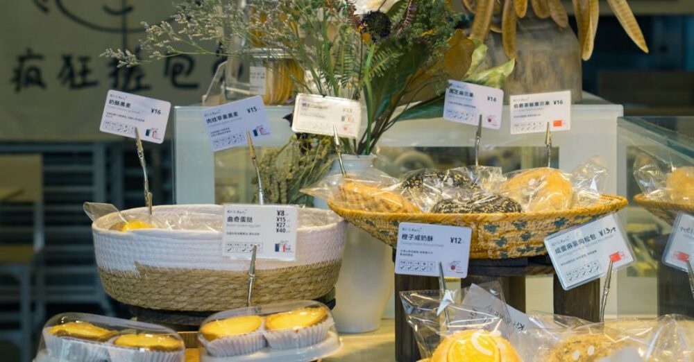 Bakeries - A display case with various types of food on it