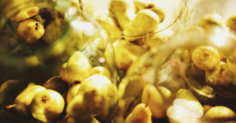 Preserves - Close-up of Pears in Glass Containers