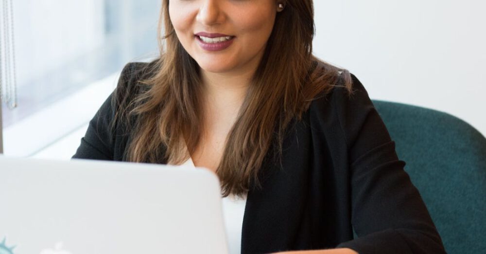 Business - Photography of a Woman Using Laptop