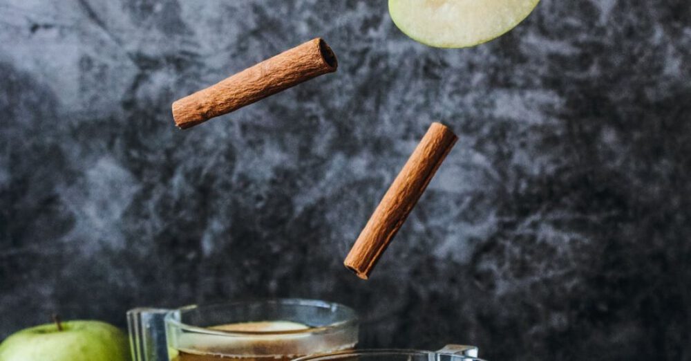 Cider - Photo of Slice Green Apple and Cinnamon Stick